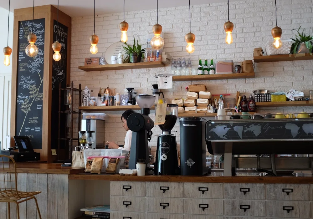 A coffee cup set against a heritage kopitiam atmosphere